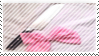 stamp with a knife and a pink ribbon